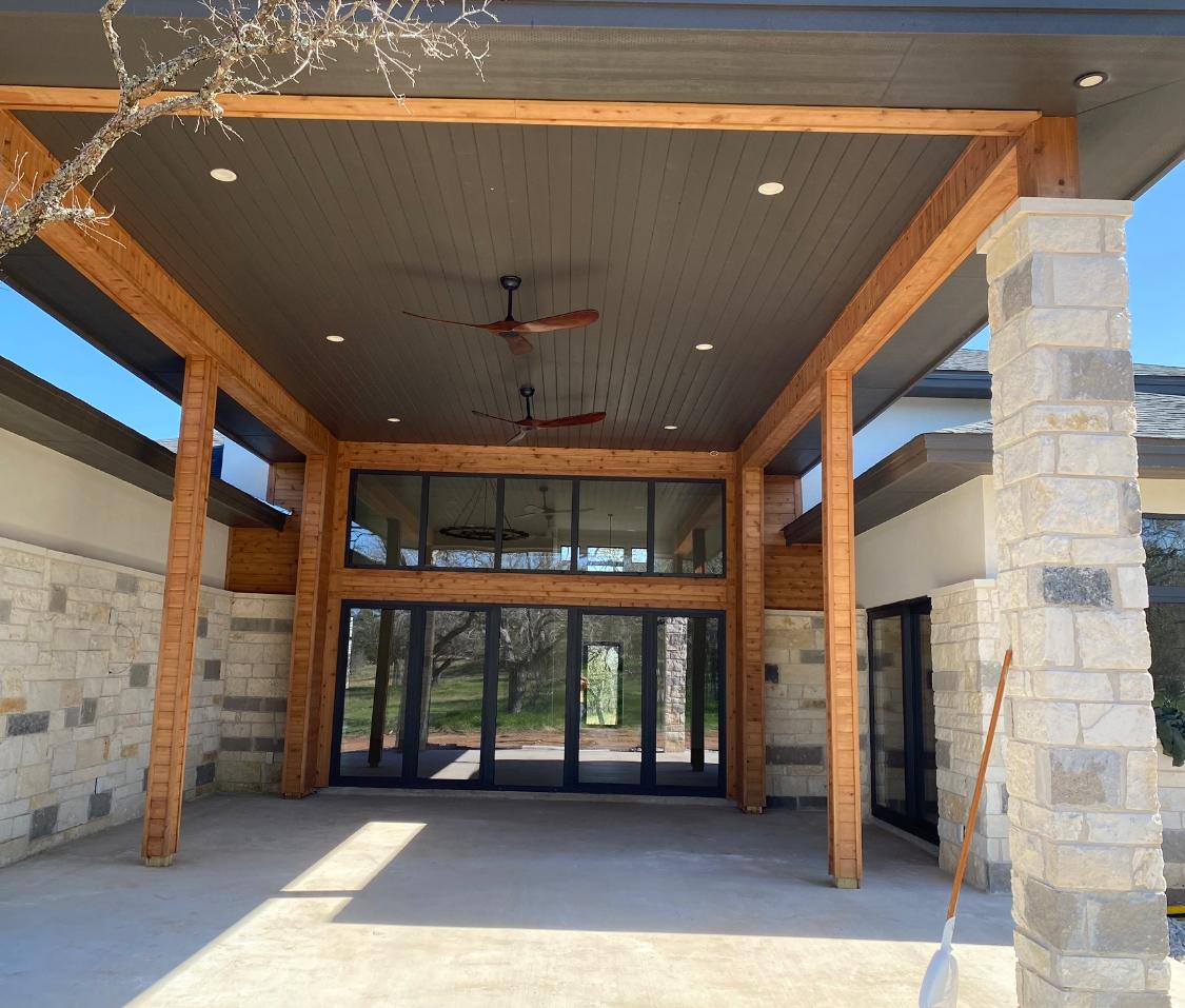 Covered patio with retractable glass doors